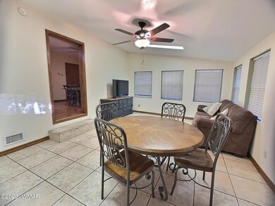 Living Room with Windows al around