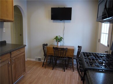 FULLY EQUIPPED KITCHEN WITH EAT IN AREA
