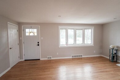 View from the kitchen to the front of the living r