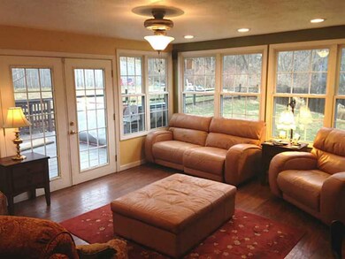 Sunroom. Spacious Sun Room / Casual Family Room wi