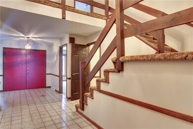Upon entry, an expansive foyer.