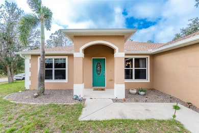 The front of the home features a covered entry!