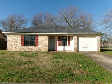 Ranch-style house featuring an attached garage, dr