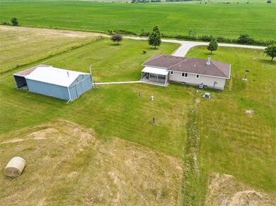 Rear view of home, Out Building and Pole Barn