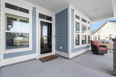 Doorway to property with a porch