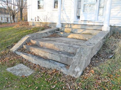 Stately granite steps to the front...