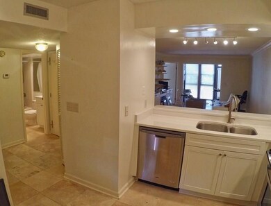 Travertine Tile in Kitchen and Foyer