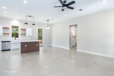 Unfurnished living room with recessed lighting, a 