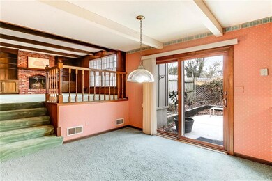 The breakfast rooms is open to the enclosed patio 