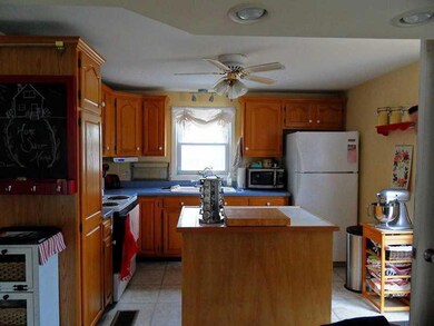 Kitchen. Island houses the...