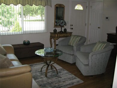 View out the front window in the living room of th