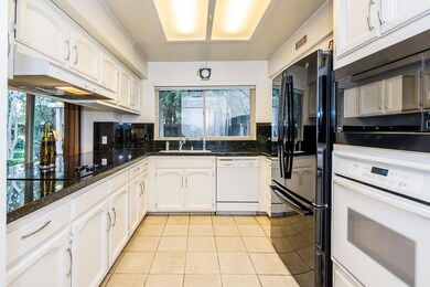 Updated kitchen with painted cabinets, new fixture