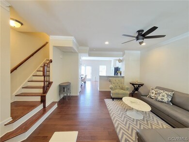 Family room featuring hardwood flooring, ornamenta