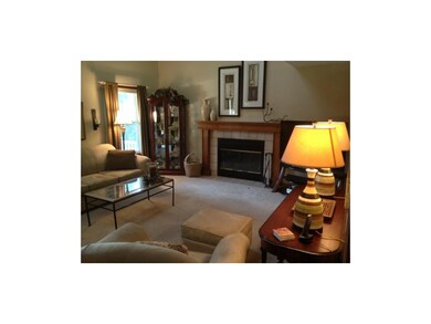 Large windows in formal living room.