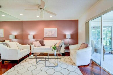 Crown moldings and recessed lighting complement an