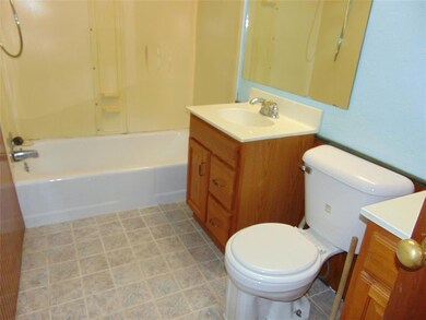 Full bathroom with vanity, toilet, and shower / ba
