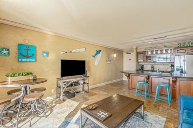 Open-concept living and kitchen area offers genero