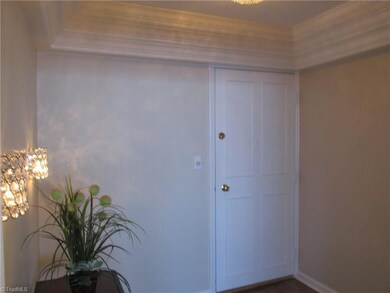 The entrance to unit 1202 is the only one in the building boasting an elaborate millwork package. Guests are immediately greeted with elegance and style when entering the home.