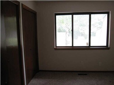 ONE OF TWO MAIN FLOOR BEDROOMS