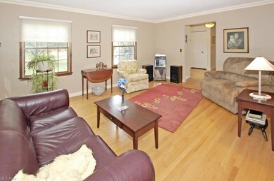 Lovely formal living room with custom window treat