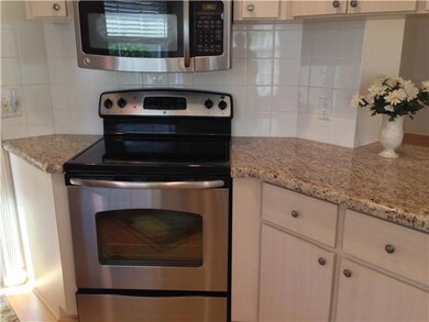 Exterior Back. oversized screened and partially roofed patio