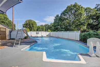 Enjoy your inground pool with slide and diving boa
