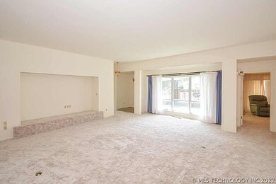 Spacious living room with two wall of windows for