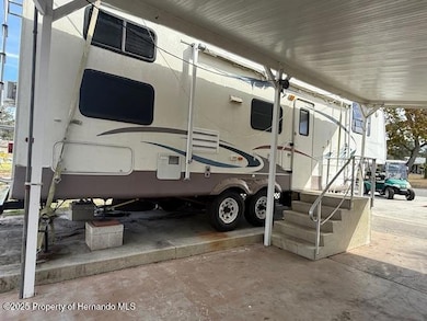 9325 Grizzly Bear Ln, Weeki Wachee, FL 34613 - photo 5