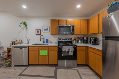Kitchen featuring appliances with stainless steel