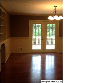 Another view of dining room and french doors.
