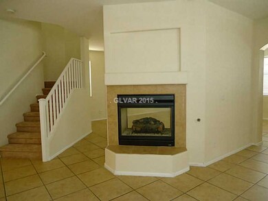 Living Room. 2 way fire place between living & fam