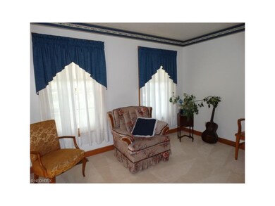 From the foyer entry you'll view the living room t