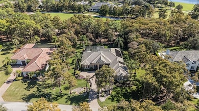 12902 Pond Apple Dr W, Naples, FL 34119 - photo 3