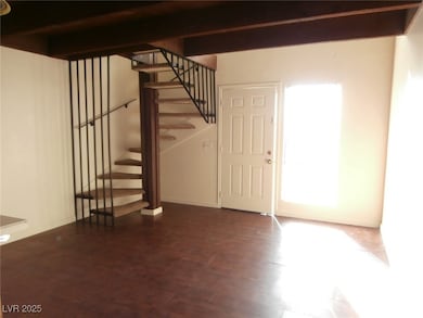 Stairs with baseboards and wood finished floors