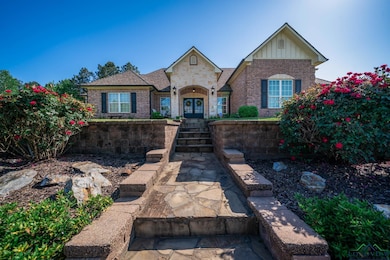 View of front of house featuring board and batten 
