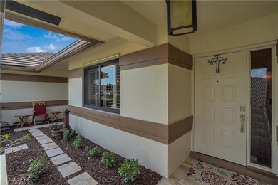 Front Door/Table, chairs, and water fountain stay