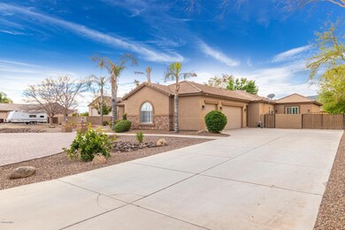 3 car garage and RV gate