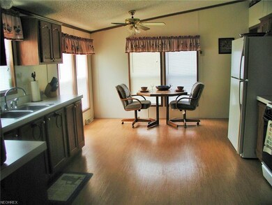 Very nice eat-in kitchen with plenty of cabinetry.