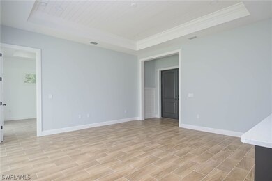 Spare room featuring light wood-type flooring and