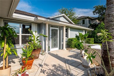 Property entrance with a patio
