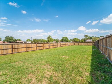 Incredibly large fenced side yard given by builder.