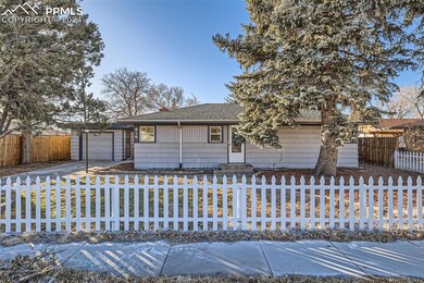 Ranch-style home with a garage