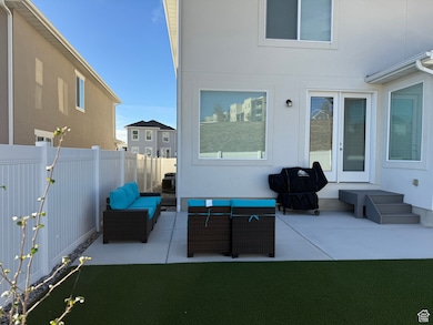 View of patio featuring an outdoor hangout area and area for grilling