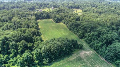 View looking West towards 18965 Sanctuary Dr with 