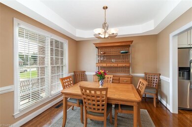 Dining room overlooks front porch and to right is entrance to Kitchen