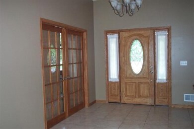 French door entrance to den.