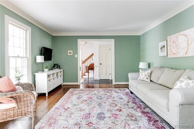 Alternate view of the living room with hardwood fl