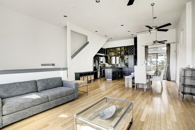 Open concept kitchen, dining and living room is fi