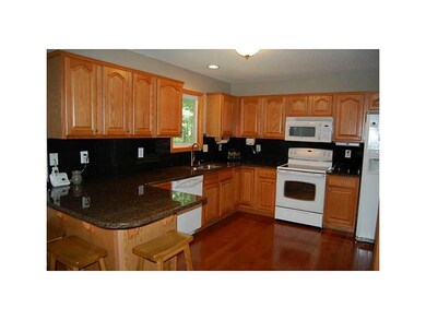 Kitchen. This stunning kitchen features granite co