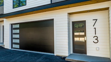 Entrance to property with a garage